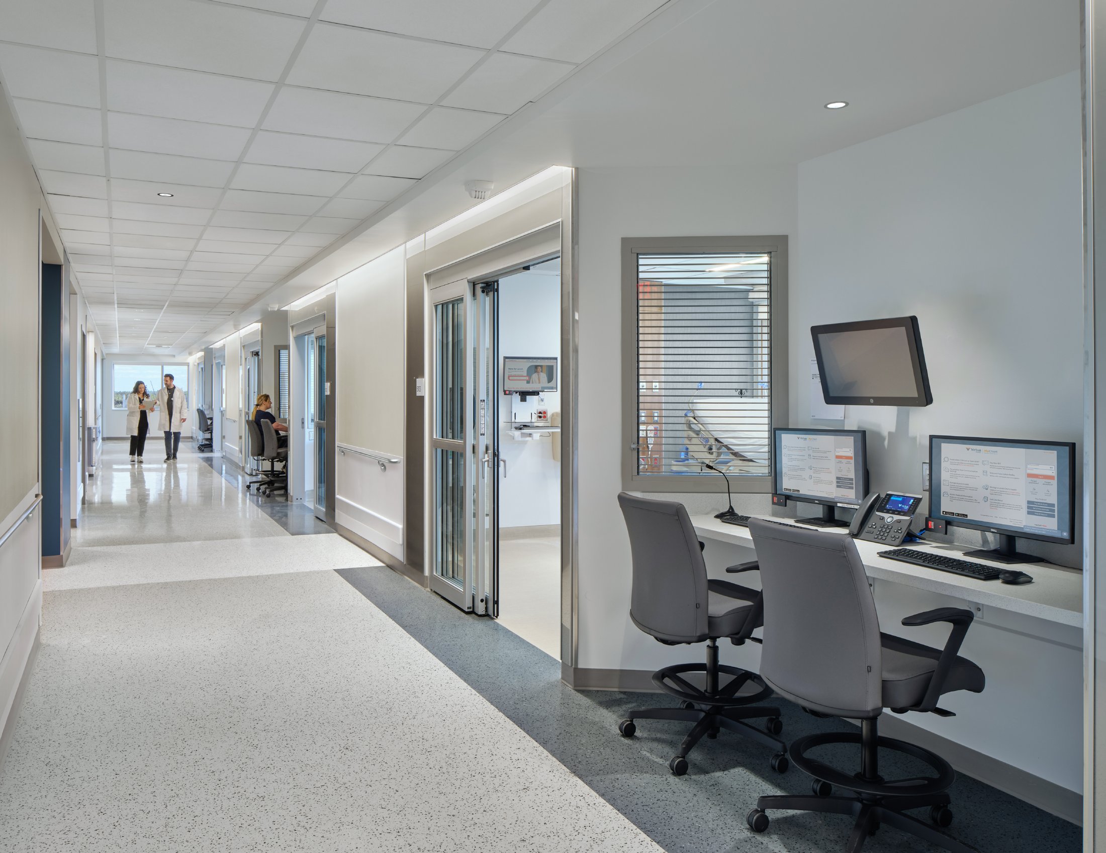 NSICU corridor and charting stations at Virtua Our Lady of Lourdes Hospital